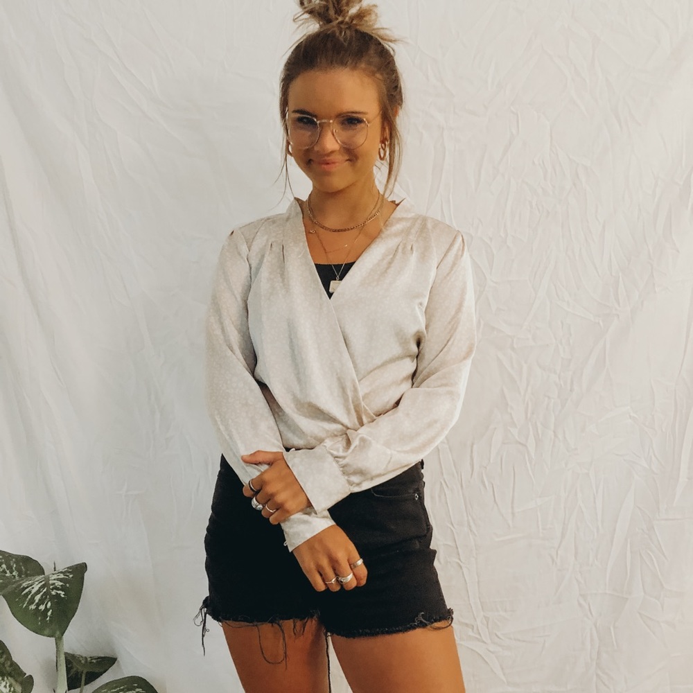 Abercrombie + Fitch silk animal print bodysuit.